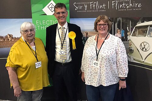 3 Libdem Councillors standing together at Flintshire county council election count